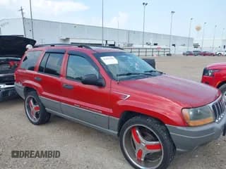 ✅ 2002 Jeep Grand Cherokee Laredo • VIN: 1J4GX48S32C137310 • Lot: 42995400. Listed on IAAI with Not provided. Free auction sales archive from the USA and detailed vehicle history report at DreamBid. Image 1.