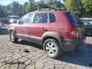 2005 Hyundai Tucson GLS with VIN KM8JN12D15U141358, listed as a Copart auction lot 73715334 with 173,503 mi miles and Salvage title. Bid and sale history available at DreamBid. Image 2.