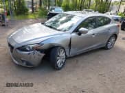 ✅ 2014 Mazda 3 S Grand Touring • VIN: JM1BM1M31E1104005 • Lot: 42808138. Listed on IAAI with 74,071 mi. Free auction sales archive from the USA and detailed vehicle history report at DreamBid. Image 2.