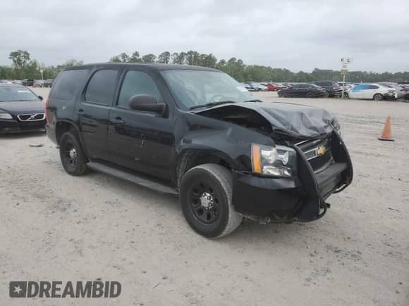 2014 Chevrolet Tahoe Commercial with VIN 1GNLC2E07ER168446, listed as a Copart auction lot 51164515 with 75,720 mi miles and Salvage title. Bid and sale history available at DreamBid. Image 4.