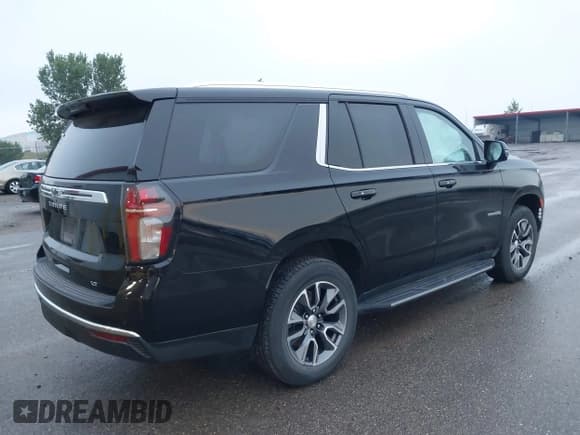 ✅ 2021 Chevrolet Tahoe LT • VIN: 1GNSKNKD2MR164939 • Lot: 42883266. Listed on IAAI with 87,555 mi. Free auction sales archive from the USA and detailed vehicle history report at DreamBid. Image 4.