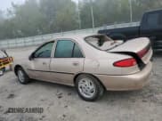 ✅ 1999 Ford Escort LX • VIN: 1FAFP10P4XW156726 • Lot: 84793665. Listed on Copart with 50,604 mi. Free auction sales archive from the USA and detailed vehicle history report at DreamBid. Image 2.