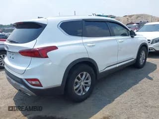 ✅ 2019 Hyundai Santa Fe SE • VIN: 5NMS23AD3KH135384 • Лот: 42862844. Опубликован ранее на IAAI с пробегом 68 008 миль. Бесплатный доступ к архиву аукционных продаж из США и подробный отчёт об истории автомобиля на DreamBid. Изображение 4.
