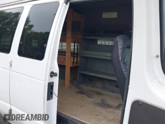 ✅ 1999 Ford Econoline Passenger XL • VIN: 1FBSS31L9XHB02264 • Lot: 42334430. Listed on IAAI with 245,860 mi. Free auction sales archive from the USA and detailed vehicle history report at DreamBid. Image 8.
