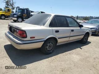 ✅ 1992 Toyota Corolla • VIN: 1NXAE94A1NZ319755 • Lot: 61456695. Listed on Copart with 247,137 mi. Free auction sales archive from the USA and detailed vehicle history report at DreamBid. Image 3.