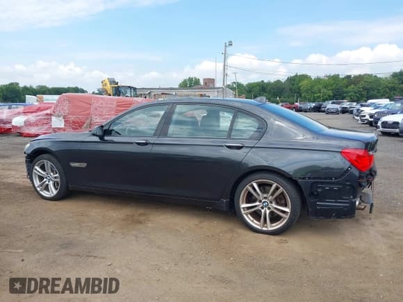 ✅ 2012 BMW 7 Series 740Li • VIN: WBAKB4C50CC575863 • Lot: 42984687. Listed on IAAI with 102,302 mi. Free auction sales archive from the USA and detailed vehicle history report at DreamBid. Image 19.