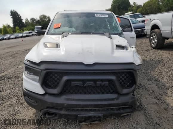 2021 Ram 1500 Rebel z VIN 1C6SRFLT1MN529318, wystawiony jako Copart lot #67312665 z przebiegiem Nie podano mil oraz Szkoda całkowita • Salvage title. Historia ofert i sprzedaży dostępna na DreamBid. Obrazek 5.