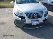 ✅ 2014 Buick Encore • VIN: KL4CJASB9EB585911 • Lot: 43711938. Listed on IAAI with 117,953 mi. Free auction sales archive from the USA and detailed vehicle history report at DreamBid. Image 6.