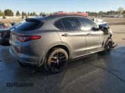 ✅ 2020 Alfa Romeo Stelvio Ti • VIN: ZASPAKBN7L7C88764 • Лот: 90049025. Опубликован ранее на Copart с пробегом 69 361 миль. Бесплатный доступ к архиву аукционных продаж из США и подробный отчёт об истории автомобиля на DreamBid. Изображение 3.