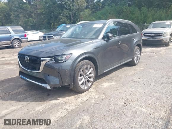 ✅ 2024 Mazda CX-90 Premium • VIN: JM3KKDHD1R1142308 • Lot: 43282823. Listed on IAAI with 49,680 mi. Free auction sales archive from the USA and detailed vehicle history report at DreamBid. Image 2.