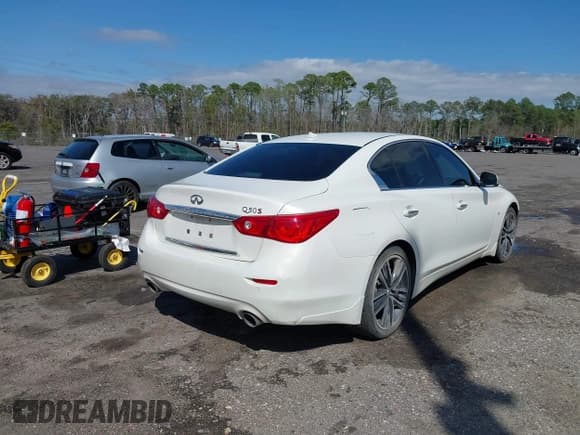 ✅ 2015 Infiniti Q50 Premium • VIN: JN1BV7APXFM331963 • Lot: 41743215. Listed on IAAI with 142,489 mi. Free auction sales archive from the USA and detailed vehicle history report at DreamBid. Image 4.
