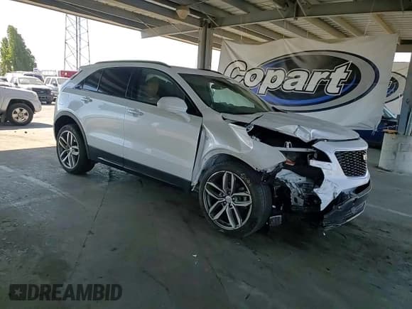 ✅ 2019 Cadillac XT4 AWD Sport • VIN: 1GYFZFR4XKF223648 • Lot: 71121405. Wystawiony na Copart z przebiegiem 64 514 mil. Bezpłatny archiwum sprzedaży aukcyjnych z USA i szczegółowy raport historii pojazdu na DreamBid. Zdjęcie 13.