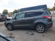 ✅ 2015 Ford Escape Titanium • VIN: 1FMCU0JX8FUB71346 • Lot: 43558511. Listed on IAAI with 127,729 mi. Free auction sales archive from the USA and detailed vehicle history report at DreamBid. Image 15.