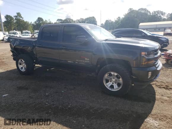 2017 Chevrolet Silverado 1500 LT with VIN 3GCUKREC6HG327464, listed as a Copart auction lot 68323465 with 152,852 mi miles and Salvage title. Bid and sale history available at DreamBid. Image 4.