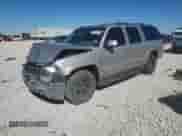 2004 Chevrolet Suburban LT z VIN 3GNEC16Z04G313261, wystawiony jako Copart lot #81499894 z przebiegiem Nie podano mil oraz Szkoda całkowita • Salvage title. Historia ofert i sprzedaży dostępna na DreamBid. Obrazek 1.