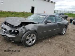 2009 Dodge Charger R/T z VIN 2B3KA53T09H630071, wystawiony jako Copart lot #58129855 z przebiegiem 200 418 mil mil oraz Szkoda całkowita • Salvage title. Historia ofert i sprzedaży dostępna na DreamBid. Obrazek 1.