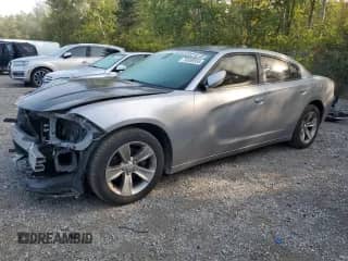 2018 Dodge Charger SXT Plus with VIN 2C3CDXHG1JH246956, listed as a Copart auction lot 70559555 with 136,700 mi miles and Clean title. Bid and sale history available at DreamBid. Image 1.