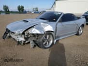 ✅ 2001 Ford Mustang GT Deluxe • VIN: 1FAFP45X61F248874 • Лот: 68766495. Опубликован ранее на Copart с пробегом 134 813 миль. Бесплатный доступ к архиву аукционных продаж из США и подробный отчёт об истории автомобиля на DreamBid. Изображение 1.