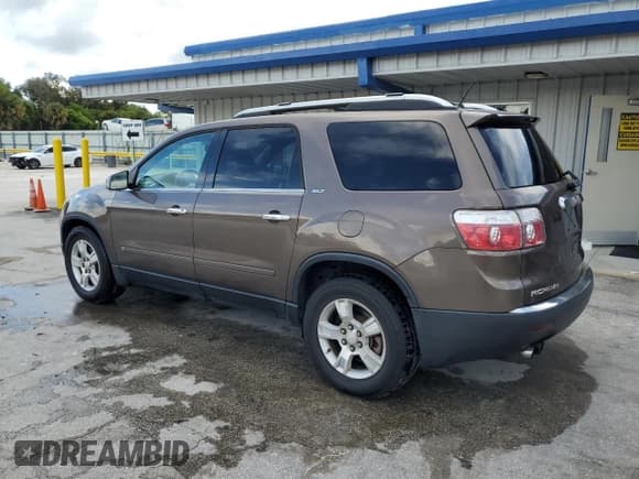 ✅ 2009 GMC Acadia SLT1 • VIN: 1GKEV23D09J140997 • Лот: 81489915. Опубликован ранее на Copart с пробегом 183 623 миль. Бесплатный доступ к архиву аукционных продаж из США и подробный отчёт об истории автомобиля на DreamBid. Изображение 2.