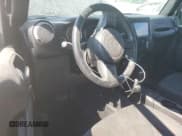 ✅ 2015 Jeep Wrangler Unlimited Freedom • VIN: 1C4BJWDG1FL745377 • Лот: 62645755. Опубликован ранее на Copart с пробегом 128 740 миль. Бесплатный доступ к архиву аукционных продаж из США и подробный отчёт об истории автомобиля на DreamBid. Изображение 8.