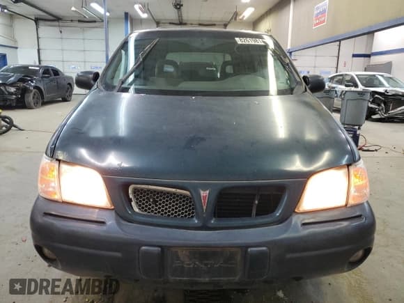 ✅ 1999 Pontiac Montana • VIN: 1GMDU06E5XD188926 • Лот: 82619814. Опубликован ранее на Copart с пробегом 179 856 миль. Бесплатный доступ к архиву аукционных продаж из США и подробный отчёт об истории автомобиля на DreamBid. Изображение 5.