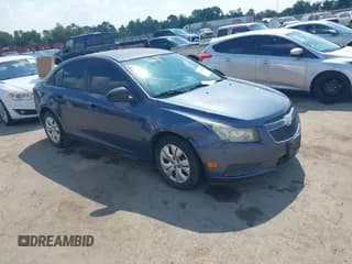 ✅ 2013 Chevrolet Cruze LS • VIN: 1G1PA5SH7D7262647 • Lot: 43359500. Listed on IAAI with 129,093 mi. Free auction sales archive from the USA and detailed vehicle history report at DreamBid. Image 1.