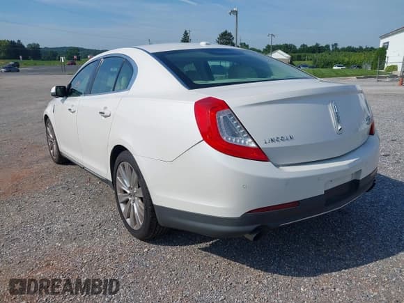 ✅ 2013 Lincoln MKS EcoBoost • VIN: 1LNHL9FT4DG614140 • Lot: 42866991. Listed on IAAI with 126,487 mi. Free auction sales archive from the USA and detailed vehicle history report at DreamBid. Image 3.