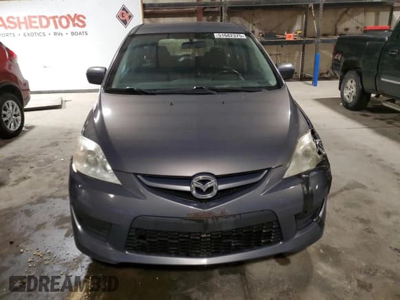 ✅ 2009 Mazda 5 Sport • VIN: JM1CR293890331482 • Лот: 51682375. Опубликован ранее на Copart с пробегом 168 454 миль. Бесплатный доступ к архиву аукционных продаж из США и подробный отчёт об истории автомобиля на DreamBid. Изображение 5.
