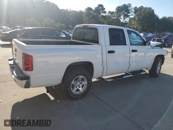 2005 Dodge Dakota SLT with VIN 1D7HE48K85S237791, listed as a Copart auction lot 73787444 with 154,958 mi miles and Salvage title. Bid and sale history available at DreamBid. Image 3.
