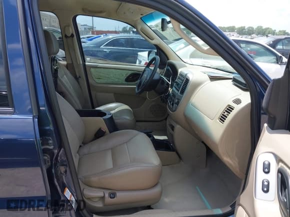 ✅ 2003 Ford Escape Limited • VIN: 1FMCU94163KA63424 • Lot: 42737023. Listed on IAAI with 137,918 mi. Free auction sales archive from the USA and detailed vehicle history report at DreamBid. Image 5.