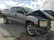 2008 Dodge Dakota SLT with VIN 1D7HE48N58S578824, listed as a Copart auction lot 78477474 with 64,557 mi miles and Salvage title. Bid and sale history available at DreamBid. Image 4.