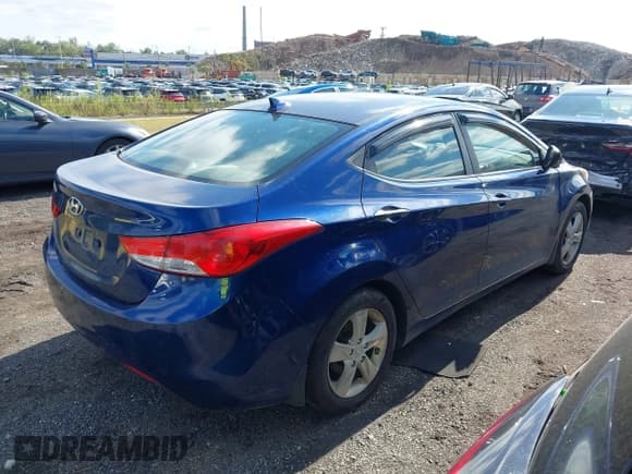 ✅ 2013 Hyundai Elantra Limited • VIN: KMHDH4AE3DU867995 • Lot: 43051546. Listed on IAAI with 113,195 mi. Free auction sales archive from the USA and detailed vehicle history report at DreamBid. Image 4.