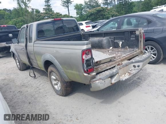 ✅ 2002 Nissan Frontier XE • VIN: 1N6DD26S82C365521 • Lot: 42497179. Listed on IAAI with 228,119 mi. Free auction sales archive from the USA and detailed vehicle history report at DreamBid. Image 3.