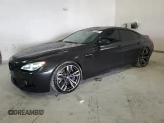 ✅ 2016 BMW M6 • VIN: WBS6E9C53GGF92658 • Lot: 79003953. Wystawiony na Copart z przebiegiem 49 231 mil. Bezpłatny archiwum sprzedaży aukcyjnych z USA i szczegółowy raport historii pojazdu na DreamBid. Zdjęcie 1.