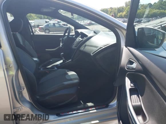 ✅ 2014 Ford Focus ST • VIN: 1FADP3L94EL365639 • Lot: 43125440. Listed on IAAI with 64,256 mi. Free auction sales archive from the USA and detailed vehicle history report at DreamBid. Image 5.