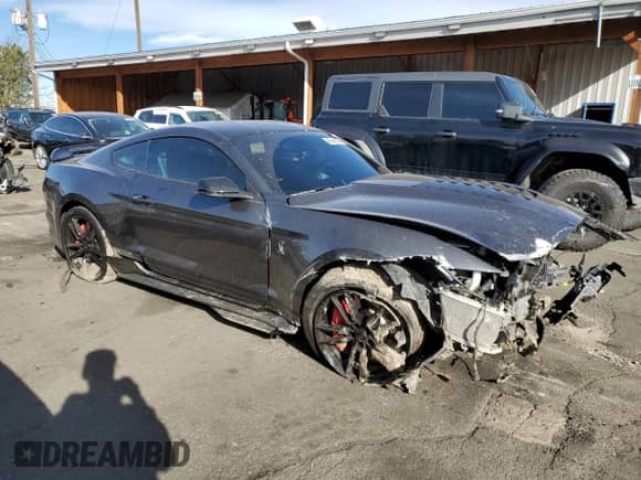 2020 Ford Mustang Shelby GT500 с VIN 1FA6P8SJ3L5505750, выставлен на аукционе Copart как лот 48548335 с пробегом 19 787 миль миль и Списание • Salvage title. История ставок и продаж доступна на DreamBid. Изображение 4.