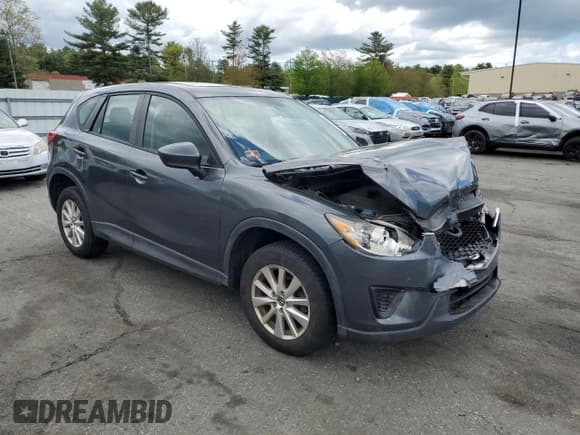 ✅ 2014 Mazda CX-5 Sport • VIN: JM3KE2BE5E0311095 • Lot: 56219775. Listed on Copart with 131,060 mi. Free auction sales archive from the USA and detailed vehicle history report at DreamBid. Image 4.