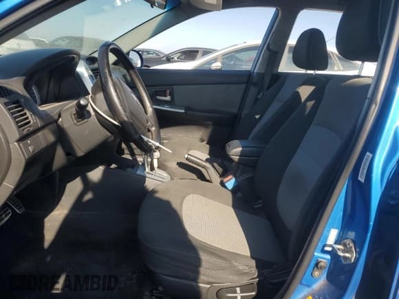 ✅ 2007 Kia Spectra • VIN: KNAFE162075006207 • Лот: 80697425. Опубликован ранее на Copart с пробегом 343 741 миль. Бесплатный доступ к архиву аукционных продаж из США и подробный отчёт об истории автомобиля на DreamBid. Изображение 7.