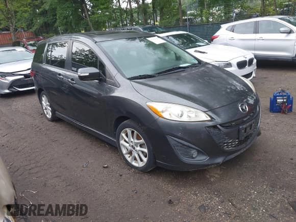 ✅ 2013 Mazda 5 Touring • VIN: JM1CW2CL8D0149999 • Lot: 42903215. Listed on IAAI with 103,051 mi. Free auction sales archive from the USA and detailed vehicle history report at DreamBid. Image 1.