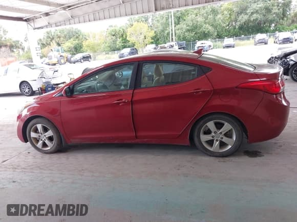 ✅ 2013 Hyundai Elantra GLS • VIN: KMHDH4AE0DU495810 • Lot: 43572371. Listed on IAAI with 83,313 mi. Free auction sales archive from the USA and detailed vehicle history report at DreamBid. Image 14.