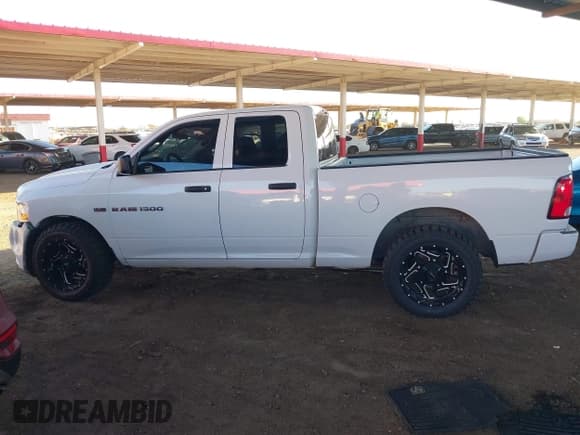 ✅ 2012 Ram 1500 Express • VIN: 1C6RD7FT1CS231155 • Lot: 43225488. Listed on IAAI with 205,781 mi. Free auction sales archive from the USA and detailed vehicle history report at DreamBid. Image 14.