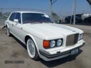 ✅ 1990 Bentley Turbo R • VIN: SCBZR03DXLCX32699 • Lot: 42960582. Wystawiony na IAAI z przebiegiem 38 147 mil. Bezpłatny archiwum sprzedaży aukcyjnych z USA i szczegółowy raport historii pojazdu na DreamBid. Zdjęcie 1.