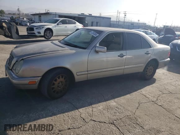 ✅ 1999 Mercedes-Benz E 320 • VIN: WDBJF65H9XA874886 • Lot: 82583865. Listed on Copart with 158,804 mi. Free auction sales archive from the USA and detailed vehicle history report at DreamBid. Image 1.