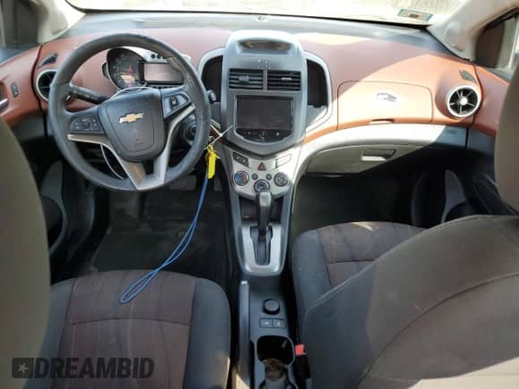 2014 Chevrolet Sonic LT с VIN 1G1JC5SH4E4106147, выставлен на аукционе Copart как лот 71822594 с пробегом 167 145 миль миль и Списание • Salvage title. История ставок и продаж доступна на DreamBid. Изображение 8.