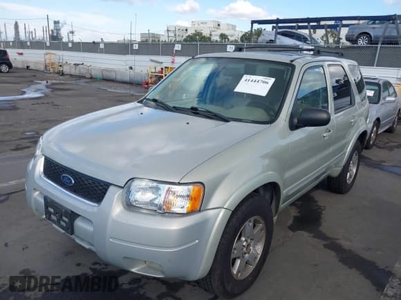 ✅ 2004 Ford Escape Limited • VIN: 1FMCU04104KA41934 • Lot: 41444706. Listed on IAAI with 169,347 mi. Free auction sales archive from the USA and detailed vehicle history report at DreamBid. Image 2.