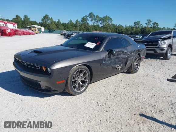 ✅ 2022 Dodge Challenger GT • VIN: 2C3CDZJG2NH230065 • Lot: 43441823. Wystawiony na IAAI z przebiegiem 64 430 mil. Bezpłatny archiwum sprzedaży aukcyjnych z USA i szczegółowy raport historii pojazdu na DreamBid. Zdjęcie 2.