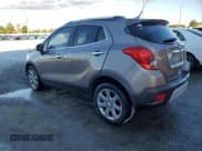 ✅ 2014 Buick Encore Leather • VIN: KL4CJCSB4EB593667 • Lot: 90907975. Wystawiony na Copart z przebiegiem 122 169 mil. Bezpłatny archiwum sprzedaży aukcyjnych z USA i szczegółowy raport historii pojazdu na DreamBid. Zdjęcie 2.