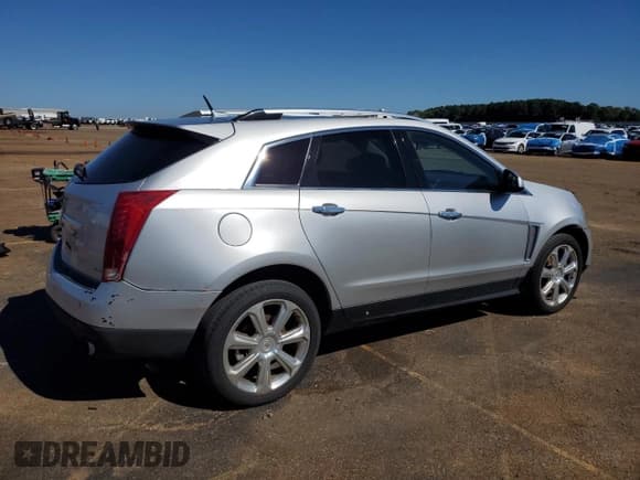 ✅ 2013 Cadillac SRX Premium Collection • VIN: 3GYFNEE31DS524701 • Lot: 84372895. Wystawiony na Copart z przebiegiem 207 688 mil. Bezpłatny archiwum sprzedaży aukcyjnych z USA i szczegółowy raport historii pojazdu na DreamBid. Zdjęcie 3.