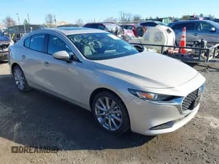 ✅ 2025 Mazda 3 S Preferred • VIN: JM1BPACMXS1765383 • Lot: 43761910. Listed on IAAI with 14,643 mi. Free auction sales archive from the USA and detailed vehicle history report at DreamBid. Image 1.