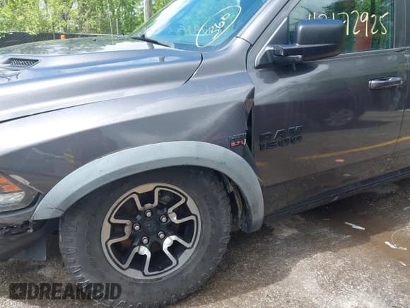 ✅ 2015 Ram 1500 Rebel • VIN: 1C6RR7YTXFS785507 • Lot: 42172925. Listed on IAAI with 100,201 mi. Free auction sales archive from the USA and detailed vehicle history report at DreamBid. Image 18.